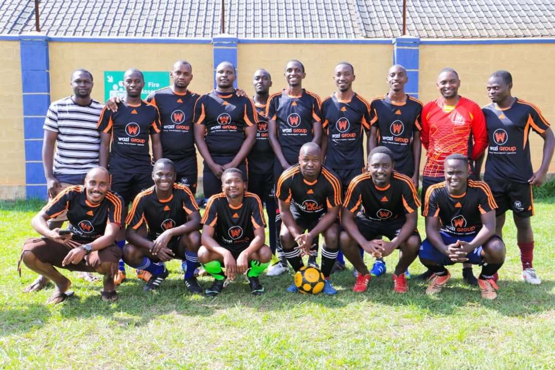 Namilyango College football team, proudly sponsored by Wazi Group Limited